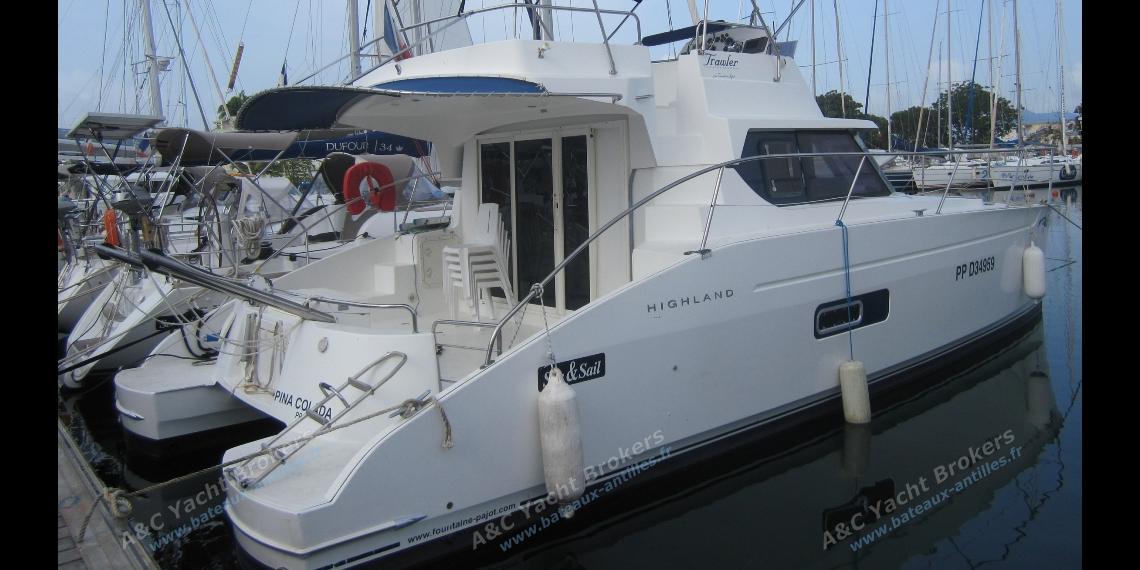 Highland 35 in the marina - Trawler Catamarans Highland 35, Used (2006) - Guadeloupe (Ref 338) Highland 35 in the marina - Trawler Catamarans Highland 35, Used (2006) - Guadeloupe (Ref 338)