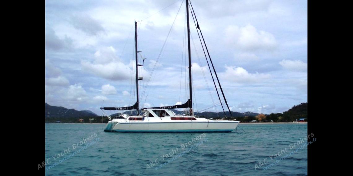 At anchor in Sainte Anne, Martinique - Gould Trimaran, Used (1980) - Martinique (Ref 230) At anchor in Sainte Anne, Martinique - Gould Trimaran, Used (1980) - Martinique (Ref 230)