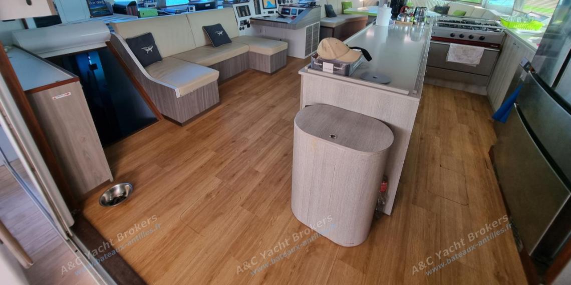Squalt Marine CK 64’ : Saloon and galley seen from the cockpit Squalt Marine CK 64’ : Saloon and galley seen from the cockpit