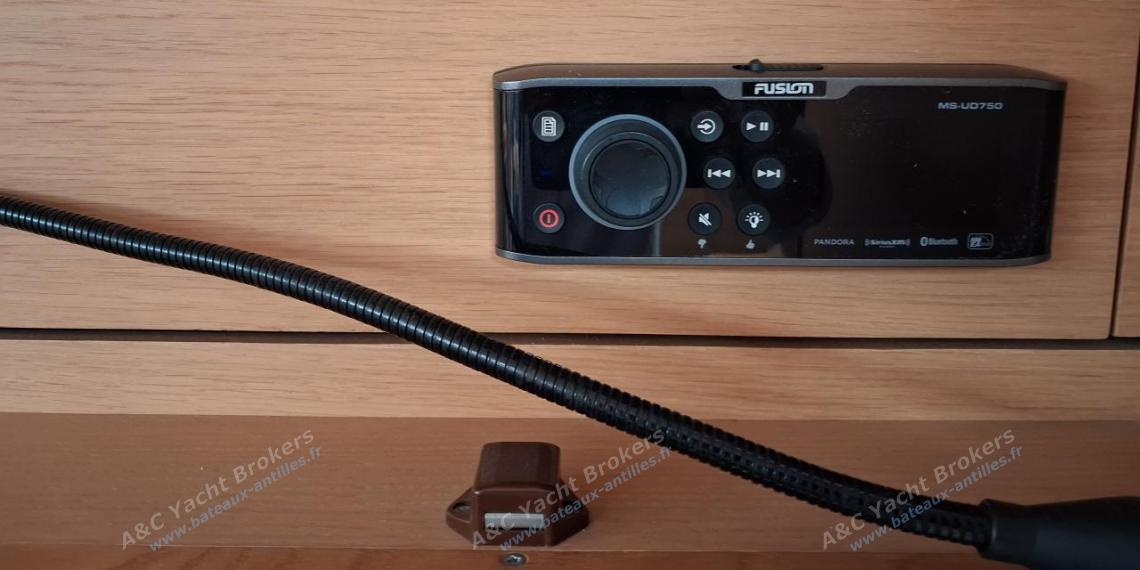 Dufour 500 Grand'Large : Radio Fusion and charge control at charts table Dufour 500 Grand'Large : Radio Fusion and charge control at charts table